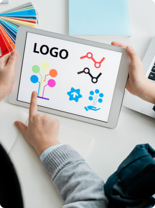 Creative team engaged in the process of logo development, crafting unique and memorable brand identities.